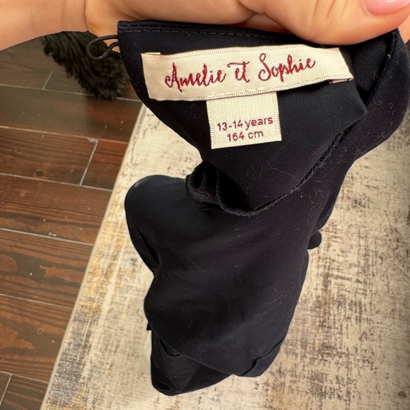 This is a size 13-14. It is a navy blue with white stripes and buttons - Picture 3 of 3